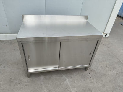 Stainless steel workbench with sliding doors front view

Restaurant prep table with built-in storage

Commercial kitchen stainless steel workbench

Side view of sliding door stainless work table

Heavy-duty garage workbench with stainless cabinet