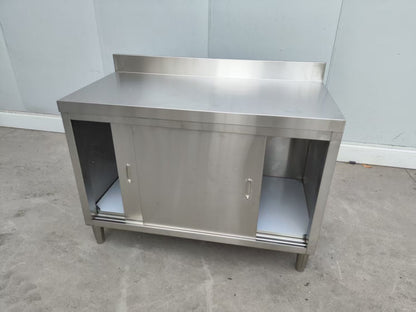 Stainless steel workbench with sliding doors front view

Restaurant prep table with built-in storage

Commercial kitchen stainless steel workbench

Side view of sliding door stainless work table

Heavy-duty garage workbench with stainless cabinet