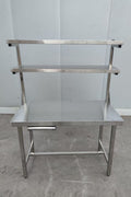 Stainless steel prep table with integrated overshelf – front view

Commercial-grade kitchen work table with upper storage

1200mm stainless prep station with dual-tier design

Heavy-duty stainless kitchen table – side angle

Restaurant overshelf prep table – silver finish

