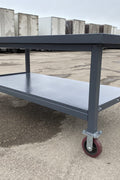 Steel Rolling Tool Table with Two Layers and Locking Casters – TC025M

Mobile Workbench with Gray Finish in Garage Setup

Heavy-Duty 2-Tier Steel Workstation for Industrial Use

Tool Table with Smooth-Rolling Wheels and Shelf Storage

Front Angle of Steel Workbench with Lower Shelf and Locking Wheels

Industrial Workshop Setup Featuring TC025M Rolling Bench

Side View of Assembled Rolling Work Table in Gray Metal