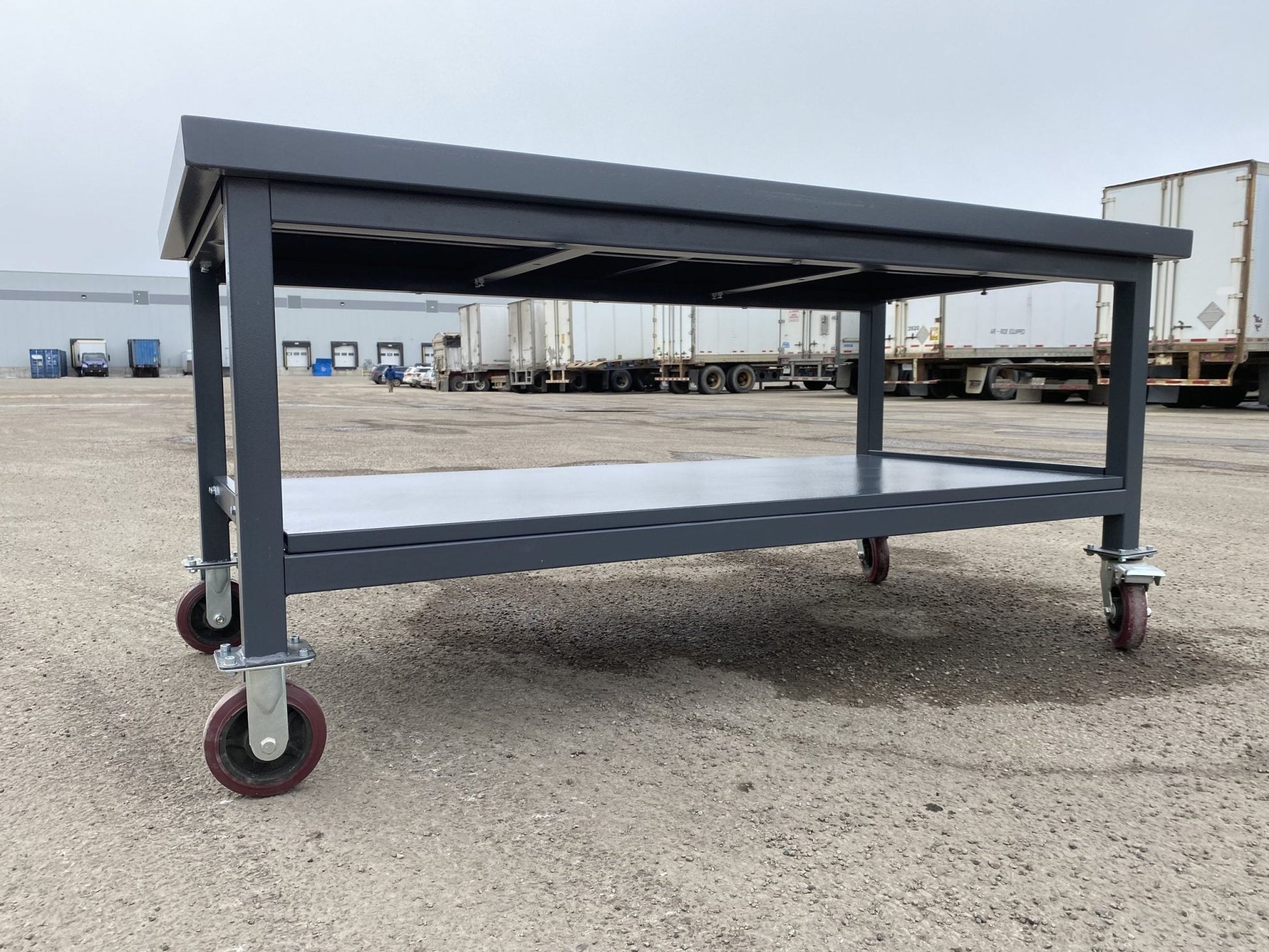 Steel Rolling Tool Table with Two Layers and Locking Casters – TC025M

Mobile Workbench with Gray Finish in Garage Setup

Heavy-Duty 2-Tier Steel Workstation for Industrial Use

Tool Table with Smooth-Rolling Wheels and Shelf Storage

Front Angle of Steel Workbench with Lower Shelf and Locking Wheels

Industrial Workshop Setup Featuring TC025M Rolling Bench

Side View of Assembled Rolling Work Table in Gray Metal