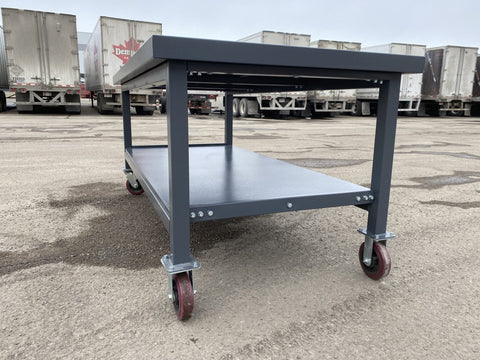 Steel Rolling Tool Table with Two Layers and Locking Casters – TC025M

Mobile Workbench with Gray Finish in Garage Setup

Heavy-Duty 2-Tier Steel Workstation for Industrial Use

Tool Table with Smooth-Rolling Wheels and Shelf Storage

Front Angle of Steel Workbench with Lower Shelf and Locking Wheels

Industrial Workshop Setup Featuring TC025M Rolling Bench

Side View of Assembled Rolling Work Table in Gray Metal