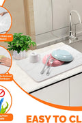 Stone quick-drying dish mat on kitchen counter with glasses
Anti-slip 18x14 inch dish drying mat absorbing water
White diatomaceous earth mat used under drying rack
Modern countertop with fast-drying stone mat and dishes