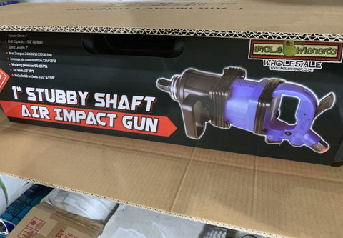 Stubby 1 inch air impact gun in blue with handle and sockets
Compact impact gun for truck and shop use
Pneumatic air impact wrench with twin hammer mechanism
Side handle stubby air tool with socket set