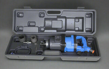 Stubby 1 inch air impact gun in blue with handle and sockets
Compact impact gun for truck and shop use
Pneumatic air impact wrench with twin hammer mechanism
Side handle stubby air tool with socket set