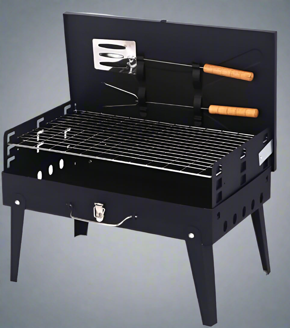 Portable suitcase-style BBQ grill folded open

Compact charcoal grill for travel and camping

Portable BBQ with meat and vegetables on the grill

Folding grill shown in backyard setup

BBQ grill packed for outdoor picnic