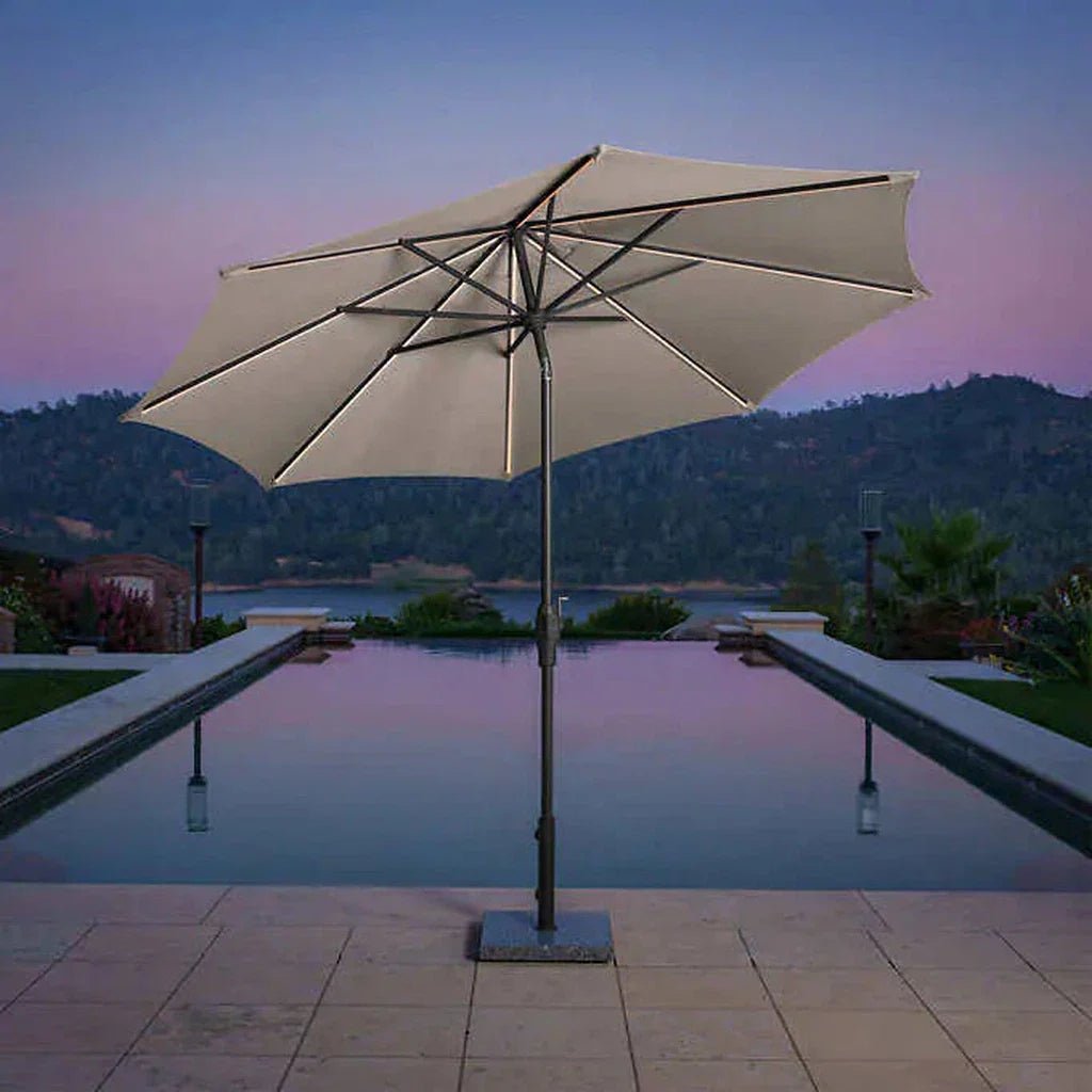 “SunVilla 10 FT LED Patio Umbrella at sunset”

“360-degree solar-powered umbrella with Outdura canopy”

“Tan SunVilla umbrella with LED lights open on patio”

“Outdoor umbrella with auto tilt feature – gray color”