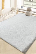 White fluffy area rug in modern living room

Gray soft rug under coffee table in cozy interior

Close-up of rug texture and anti-skid bottom

Hand touching plush surface of bedroom rug

Stylish white rug under sofa set with natural light