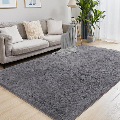 White fluffy area rug in modern living room

Gray soft rug under coffee table in cozy interior

Close-up of rug texture and anti-skid bottom

Hand touching plush surface of bedroom rug

Stylish white rug under sofa set with natural light