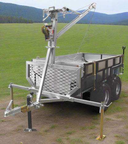 Tandem Axle ATV Off-Road Dump Trailer with Crane and Winch – Model 116501 shown with galvanized dump tub, off-road tires and gear-lifting crane