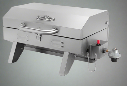 Compact stainless steel propane BBQ grill with lid closed