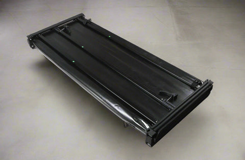 Tonneau cover folded on Ford F-250 bed
Tri-fold soft tonneau cover fully closed
Tonneau cover side view showing vinyl texture
Ford truck with tonneau cover installed – 8 ft bed
Tonneau cover folded up for easy bed access