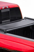 Tonneau cover folded on Ford F-250 bed
Tri-fold soft tonneau cover fully closed
Tonneau cover side view showing vinyl texture
Ford truck with tonneau cover installed – 8 ft bed
Tonneau cover folded up for easy bed access