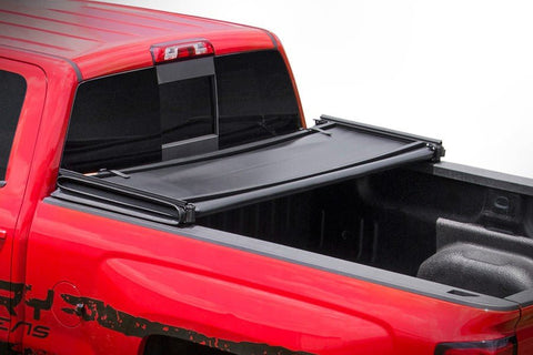 Tonneau cover folded on Ford F-250 bed
Tri-fold soft tonneau cover fully closed
Tonneau cover side view showing vinyl texture
Ford truck with tonneau cover installed – 8 ft bed
Tonneau cover folded up for easy bed access