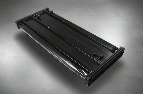 Tri-fold soft tonneau cover installed on Ford F-150 6.5 ft bed
Roll-up tonneau cover for 2009–2020 Ford truck bed
Weatherproof vinyl truck bed cover with clamp system
Tonneau cover folded up showing bed access
Side view of tri-fold tonneau cover on Ford F-150