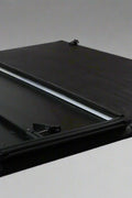 Tri-fold soft tonneau cover installed on Ford F-150 6.5 ft bed
Roll-up tonneau cover for 2009–2020 Ford truck bed
Weatherproof vinyl truck bed cover with clamp system
Tonneau cover folded up showing bed access
Side view of tri-fold tonneau cover on Ford F-150
