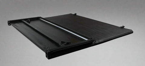 Tri-fold soft tonneau cover installed on Ford F-150 6.5 ft bed
Roll-up tonneau cover for 2009–2020 Ford truck bed
Weatherproof vinyl truck bed cover with clamp system
Tonneau cover folded up showing bed access
Side view of tri-fold tonneau cover on Ford F-150