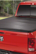 Tri-fold soft tonneau cover installed on Ford F-150 6.5 ft bed
Roll-up tonneau cover for 2009–2020 Ford truck bed
Weatherproof vinyl truck bed cover with clamp system
Tonneau cover folded up showing bed access
Side view of tri-fold tonneau cover on Ford F-150