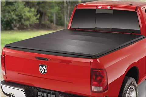 Tri-fold soft tonneau cover installed on Ford F-150 6.5 ft bed
Roll-up tonneau cover for 2009–2020 Ford truck bed
Weatherproof vinyl truck bed cover with clamp system
Tonneau cover folded up showing bed access
Side view of tri-fold tonneau cover on Ford F-150