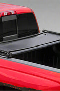 Tri-fold soft tonneau cover installed on Ford F-150 6.5 ft bed
Roll-up tonneau cover for 2009–2020 Ford truck bed
Weatherproof vinyl truck bed cover with clamp system
Tonneau cover folded up showing bed access
Side view of tri-fold tonneau cover on Ford F-150