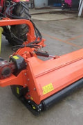 Heavy-duty PTO flail mower for tractors – 71 inch cutting width
BCR180 3-point flail mower side view – orange color
Tractor-mounted flail mower – cutting field grass
PTO flail mower attachment with hydraulic side shift and rotor housing