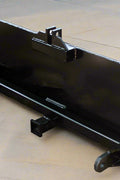 HLA67 skid steer to 3-point hitch plate – front angle
Rear view of 3-point skid steer adapter with lift arms
Close-up of 2" trailer receiver hitch on adapter plate
Side profile of Category 1 & 2 compatible plate
Adjustable lift arms and steel plate design