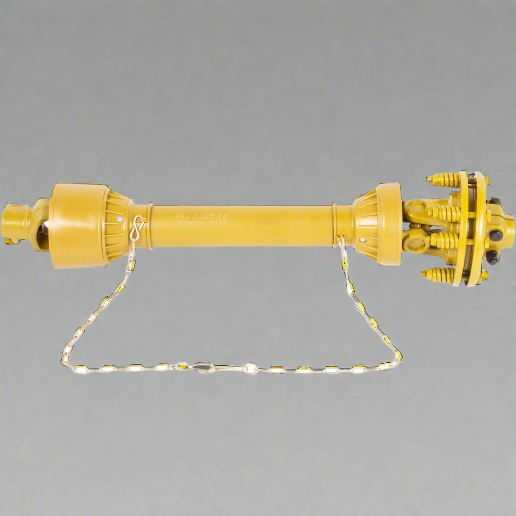 Yellow Series 4 PTO shaft with 6-spline ends and safety cover – isolated view
Diagram showing PTO shaft specs and torque performance
PTO shaft installed on orange tractor with mower attachment
Detailed view of 6-spline and round-end connectors on PTO shaft