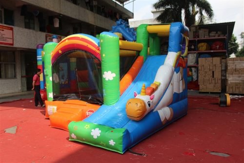 Unicorn inflatable bouncy castle with slide combo for kids
Commercial-grade bounce house with blower and mesh safety walls
Unicorn-themed inflatable play structure with vibrant colors
Side view of vinyl inflatable bouncer and slide unit
Top view of inflatable unicorn castle combo for children’s events