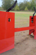 Red tree and fence post puller attachment for skid steer
Side view of HLA95 quick attach post puller
Close-up of welded frame and mounting plate
Top view of post puller showing jaw spacing
Tree and post puller connected to tractor
