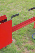 Red tree and fence post puller attachment for skid steer
Side view of HLA95 quick attach post puller
Close-up of welded frame and mounting plate
Top view of post puller showing jaw spacing
Tree and post puller connected to tractor