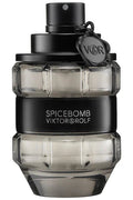 Spicebomb cologne bottle next to packaging

3.04 oz Viktor&Rolf men’s fragrance close-up

Dark masculine cologne with spice and wood background


