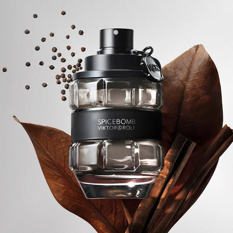 Spicebomb cologne bottle next to packaging

3.04 oz Viktor&Rolf men’s fragrance close-up

Dark masculine cologne with spice and wood background
