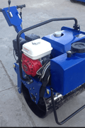 Walk-behind vibratory roller with blue engine cover – compact design
Single drum asphalt roller with 5 HP engine for construction use
Hydraulic vibratory roller for road repair and surface compaction