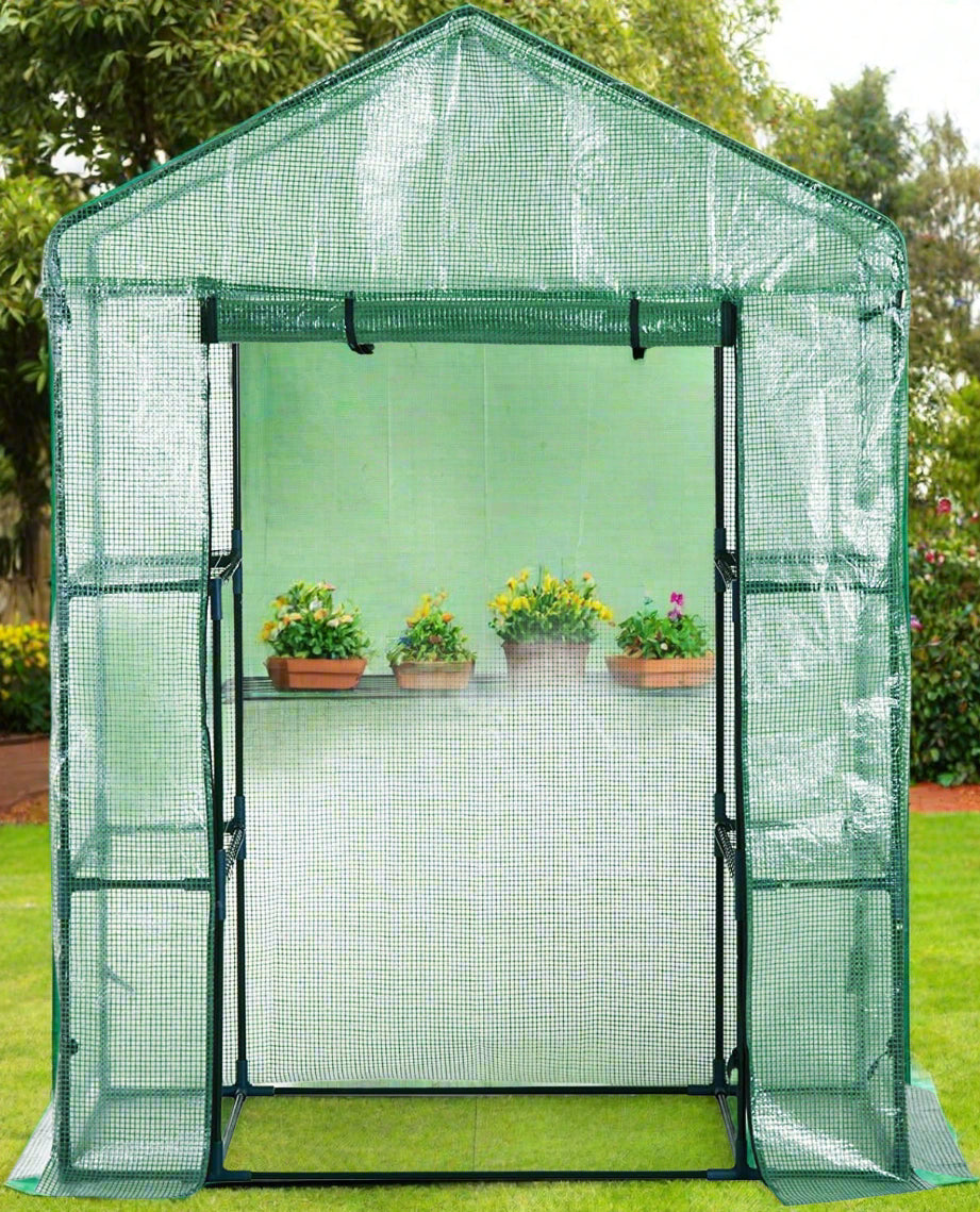 Walk-in roll-up greenhouse with zippered front door
Outdoor greenhouse with wired shelves and green PE cover
Garden greenhouse for patio and balcony setups
Roll-up front entry greenhouse shown outdoors
Compact greenhouse model GC3232 with sturdy shelves
Indoor/outdoor mini greenhouse with UV-resistant cover