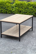 Minimalist wood grain coffee table in a living room setting
Side view of coffee table with black metal frame
Open shelf coffee table for modern homes
Neutral-toned coffee table with sturdy build
Lifestyle photo of coa ffee table with décor accessories