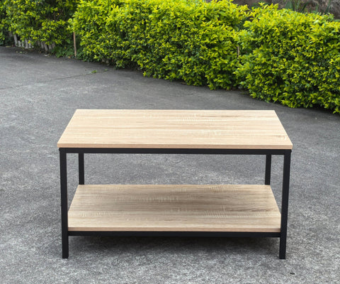 Minimalist wood grain coffee table in a living room setting
Side view of coffee table with black metal frame
Open shelf coffee table for modern homes
Neutral-toned coffee table with sturdy build
Lifestyle photo of coa ffee table with décor accessories