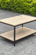 Minimalist wood grain coffee table in a living room setting
Side view of coffee table with black metal frame
Open shelf coffee table for modern homes
Neutral-toned coffee table with sturdy build
Lifestyle photo of coa ffee table with décor accessories