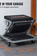 Folding mechanic creeper seat compactly stored in garage space
