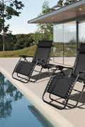 Zero Gravity Recliner Chairs – Adjustable Patio Set (Front View)

Foldable Outdoor Reclining Lounge Chairs – Set of 2

Zero Gravity Chairs Folded – Compact Storage View

Recliner Chairs Fully Reclined by Poolside – Set of Two

Patio Chairs with Adjustable Headrests – Black Mesh

Outdoor Lounge Recliner Chairs – Camping Ready Set