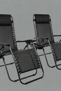 Zero Gravity Recliner Chairs – Adjustable Patio Set (Front View)

Foldable Outdoor Reclining Lounge Chairs – Set of 2

Zero Gravity Chairs Folded – Compact Storage View

Recliner Chairs Fully Reclined by Poolside – Set of Two

Patio Chairs with Adjustable Headrests – Black Mesh

Outdoor Lounge Recliner Chairs – Camping Ready Set