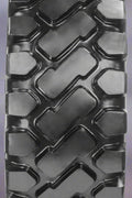 Heavy-duty E-3/L3 bias ply loader tire on warehouse floor

Rock lug pattern close-up for traction

20.5-25 loader tire tread and sidewall view

Mining OTR tire mounted on equipment

Rugged loader tire for industrial applications