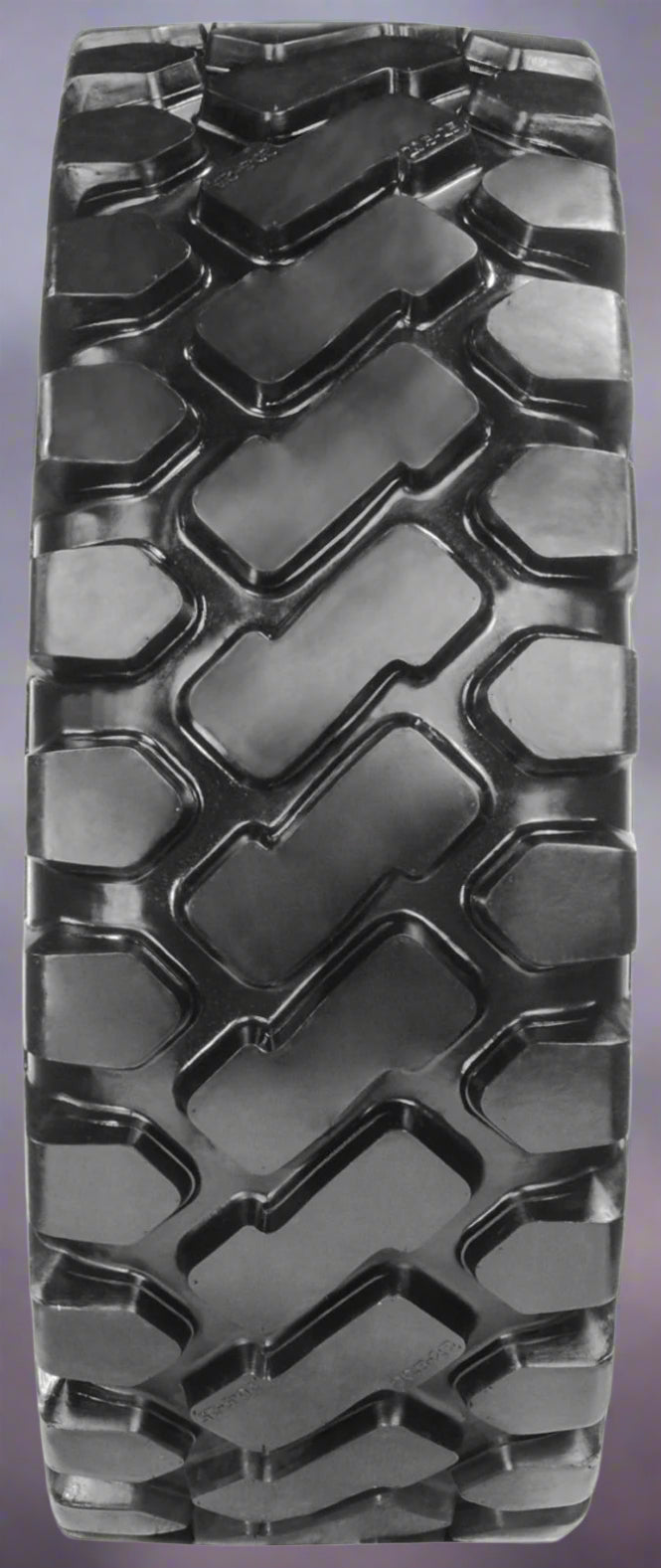 Heavy-duty E-3/L3 bias ply loader tire on warehouse floor

Rock lug pattern close-up for traction

20.5-25 loader tire tread and sidewall view

Mining OTR tire mounted on equipment

Rugged loader tire for industrial applications
