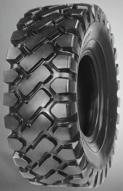 Heavy-duty E-3/L3 bias ply loader tire on warehouse floor

Rock lug pattern close-up for traction

20.5-25 loader tire tread and sidewall view

Mining OTR tire mounted on equipment

Rugged loader tire for industrial applications