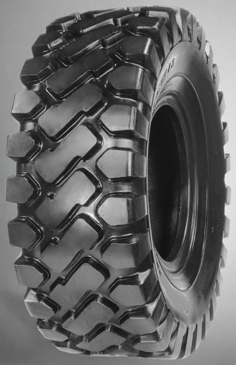 Heavy-duty E-3/L3 bias ply loader tire on warehouse floor

Rock lug pattern close-up for traction

20.5-25 loader tire tread and sidewall view

Mining OTR tire mounted on equipment

Rugged loader tire for industrial applications