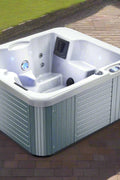 Top-down view of acrylic outdoor spa with seating and jets