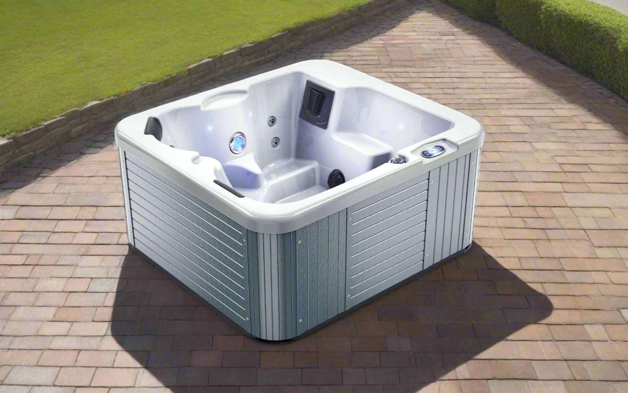 Top-down view of acrylic outdoor spa with seating and jets