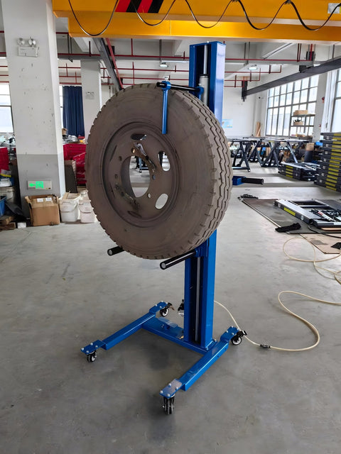 Pneumatic wheel lift blue with tire holder

TTL90130 portable tire handler side view

Pneumatic tire lift for shop use, 200 lb capacity
