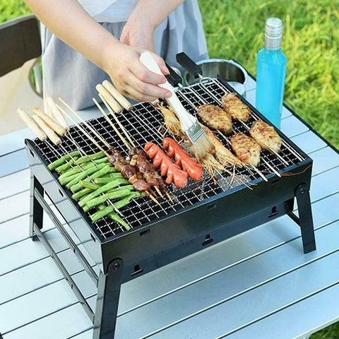 “Compact portable charcoal BBQ grill with food cooking”

“Foldable stainless steel grill for camping”

“Backyard charcoal BBQ grill setup for outdoor use”