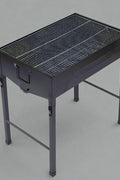 “Compact portable charcoal BBQ grill with food cooking”

“Foldable stainless steel grill for camping”

“Backyard charcoal BBQ grill setup for outdoor use”