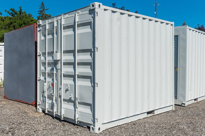 Front view of 8FT gray mini storage container

Side angle of compact steel shipping container

Portable storage containers in different sizes

Bi-parting swing doors and back entry detail

Onsite use of mini steel storage box